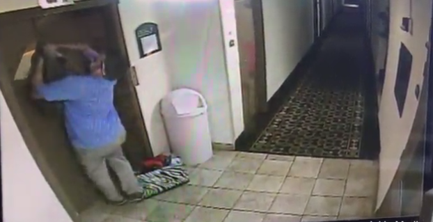 Dog saved after leash caught in elevator door