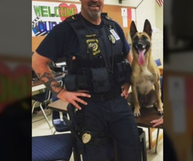 Charges dropped against officer in case of dog's death