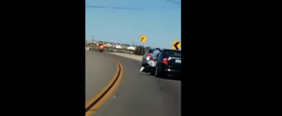 Man dragged by moving car