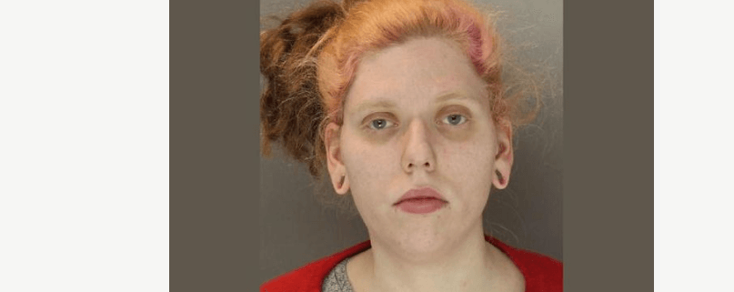 Woman accused of stealing and burning dog