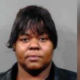 Woman accused of being dog to death with tire iron
